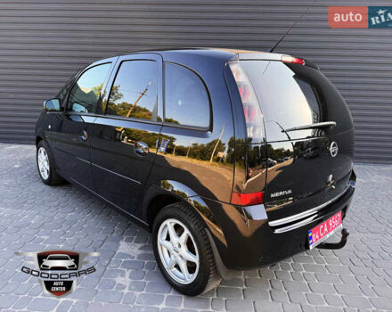 Черный Опель Мерива, объемом двигателя 1.6 л и пробегом 205 тыс. км за 6500 $, фото 3 на Automoto.ua