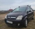 Черный Опель Мерива, объемом двигателя 1.6 л и пробегом 186 тыс. км за 3300 $, фото 5 на Automoto.ua