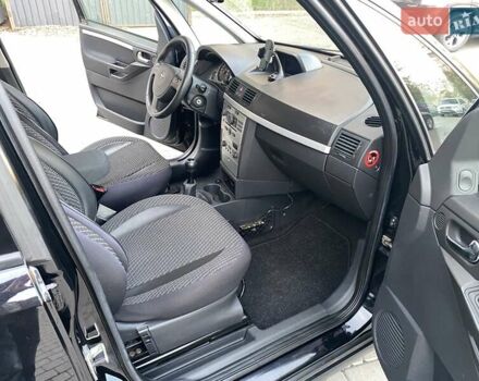 Черный Опель Мерива, объемом двигателя 1.8 л и пробегом 260 тыс. км за 5800 $, фото 18 на Automoto.ua