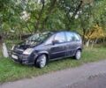 Черный Опель Мерива, объемом двигателя 1.6 л и пробегом 145 тыс. км за 2499 $, фото 2 на Automoto.ua
