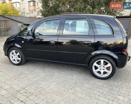 Черный Опель Мерива, объемом двигателя 1.8 л и пробегом 260 тыс. км за 5800 $, фото 4 на Automoto.ua