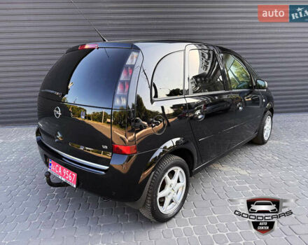 Черный Опель Мерива, объемом двигателя 1.6 л и пробегом 205 тыс. км за 6500 $, фото 1 на Automoto.ua