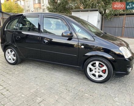 Черный Опель Мерива, объемом двигателя 1.8 л и пробегом 260 тыс. км за 5800 $, фото 10 на Automoto.ua