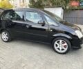 Черный Опель Мерива, объемом двигателя 1.8 л и пробегом 260 тыс. км за 5800 $, фото 10 на Automoto.ua