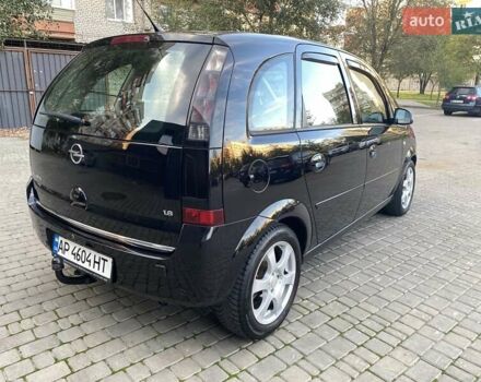 Черный Опель Мерива, объемом двигателя 1.8 л и пробегом 260 тыс. км за 5800 $, фото 15 на Automoto.ua