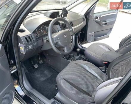 Черный Опель Мерива, объемом двигателя 1.8 л и пробегом 260 тыс. км за 5800 $, фото 16 на Automoto.ua