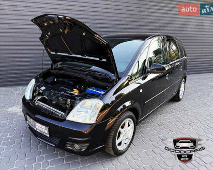 Черный Опель Мерива, объемом двигателя 1.6 л и пробегом 205 тыс. км за 6500 $, фото 5 на Automoto.ua