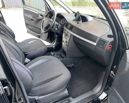 Черный Опель Мерива, объемом двигателя 1.8 л и пробегом 260 тыс. км за 5800 $, фото 17 на Automoto.ua