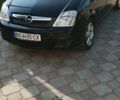 Черный Опель Мерива, объемом двигателя 1.6 л и пробегом 250 тыс. км за 4600 $, фото 1 на Automoto.ua