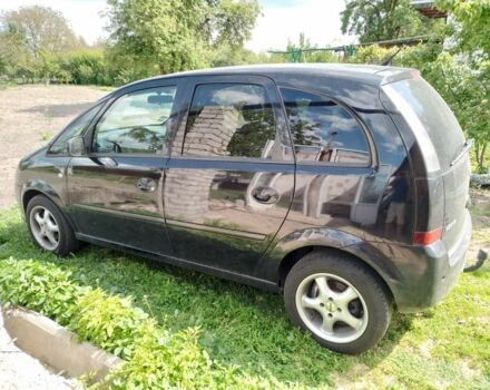 Черный Опель Мерива, объемом двигателя 1.4 л и пробегом 160 тыс. км за 3700 $, фото 1 на Automoto.ua