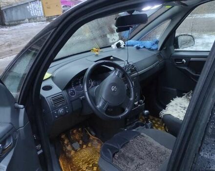 Черный Опель Мерива, объемом двигателя 1.4 л и пробегом 205 тыс. км за 5500 $, фото 4 на Automoto.ua