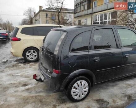 Черный Опель Мерива, объемом двигателя 1.4 л и пробегом 205 тыс. км за 5500 $, фото 1 на Automoto.ua