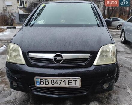 Черный Опель Мерива, объемом двигателя 1.4 л и пробегом 205 тыс. км за 5500 $, фото 9 на Automoto.ua