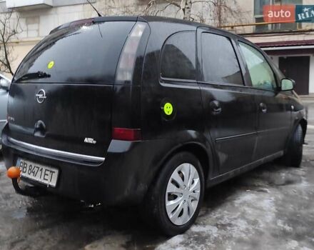 Черный Опель Мерива, объемом двигателя 1.4 л и пробегом 205 тыс. км за 5500 $, фото 7 на Automoto.ua