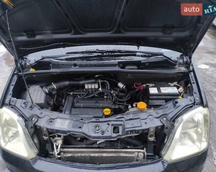 Черный Опель Мерива, объемом двигателя 1.4 л и пробегом 205 тыс. км за 5500 $, фото 6 на Automoto.ua