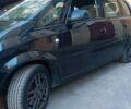 Черный Опель Мерива, объемом двигателя 1.2 л и пробегом 205 тыс. км за 6500 $, фото 2 на Automoto.ua