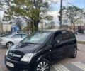 Черный Опель Мерива, объемом двигателя 1.6 л и пробегом 250 тыс. км за 4199 $, фото 1 на Automoto.ua