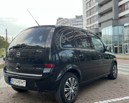Черный Опель Мерива, объемом двигателя 1.6 л и пробегом 250 тыс. км за 4199 $, фото 6 на Automoto.ua