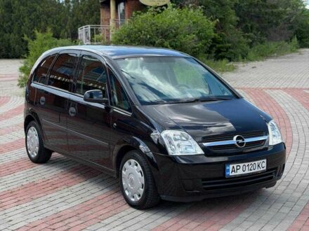 Черный Опель Мерива, объемом двигателя 1.6 л и пробегом 174 тыс. км за 3999 $, фото 1 на Automoto.ua