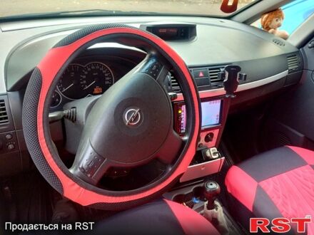 Черный Опель Мерива, объемом двигателя 1.6 л и пробегом 295 тыс. км за 3500 $, фото 1 на Automoto.ua