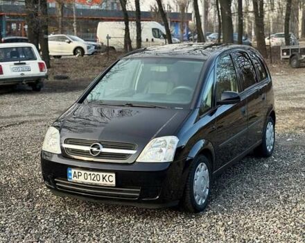 Черный Опель Мерива, объемом двигателя 1.6 л и пробегом 171 тыс. км за 4200 $, фото 1 на Automoto.ua