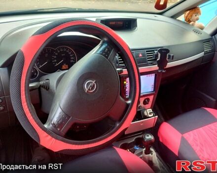 Черный Опель Мерива, объемом двигателя 1.6 л и пробегом 295 тыс. км за 3500 $, фото 1 на Automoto.ua