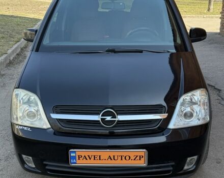 Черный Опель Мерива, объемом двигателя 1.6 л и пробегом 182 тыс. км за 4750 $, фото 1 на Automoto.ua