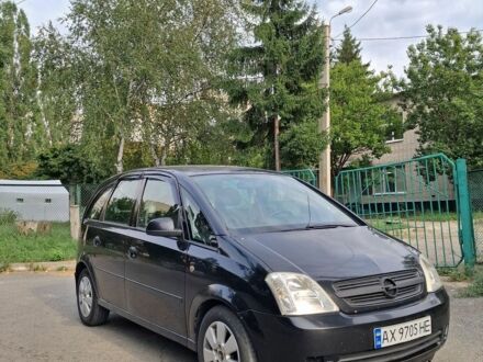 Черный Опель Мерива, объемом двигателя 1.7 л и пробегом 370 тыс. км за 3600 $, фото 1 на Automoto.ua