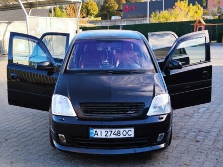 Чорний Опель Меріва, об'ємом двигуна 1.8 л та пробігом 210 тис. км за 5500 $, фото 1 на Automoto.ua