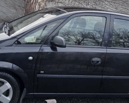 Черный Опель Мерива, объемом двигателя 1.4 л и пробегом 150 тыс. км за 5000 $, фото 1 на Automoto.ua