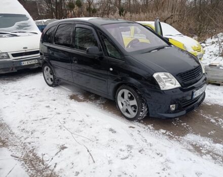 Черный Опель Мерива, объемом двигателя 0 л и пробегом 230 тыс. км за 4800 $, фото 1 на Automoto.ua