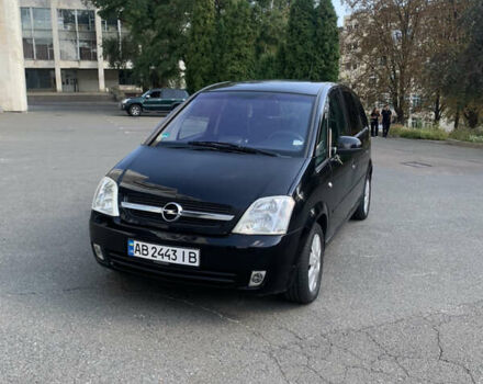 Черный Опель Мерива, объемом двигателя 1.6 л и пробегом 224 тыс. км за 4100 $, фото 1 на Automoto.ua