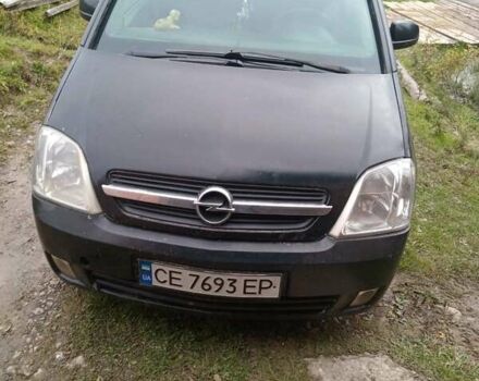 Черный Опель Мерива, объемом двигателя 1.69 л и пробегом 240 тыс. км за 2800 $, фото 1 на Automoto.ua