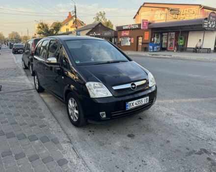 Черный Опель Мерива, объемом двигателя 1.4 л и пробегом 200 тыс. км за 3850 $, фото 1 на Automoto.ua