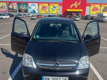 Черный Опель Мерива, объемом двигателя 1.36 л и пробегом 207 тыс. км за 4250 $, фото 1 на Automoto.ua