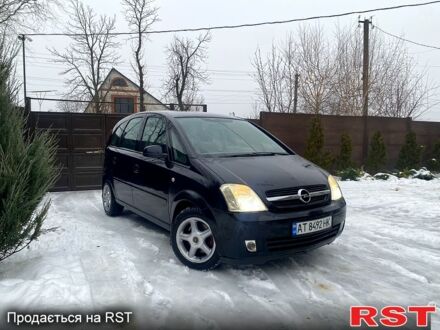 Черный Опель Мерива, объемом двигателя 1.6 л и пробегом 240 тыс. км за 4500 $, фото 1 на Automoto.ua