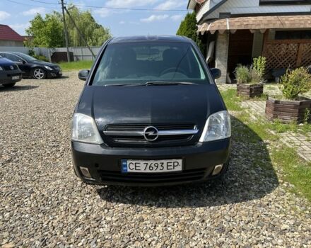 Черный Опель Мерива, объемом двигателя 1.7 л и пробегом 300 тыс. км за 3300 $, фото 1 на Automoto.ua