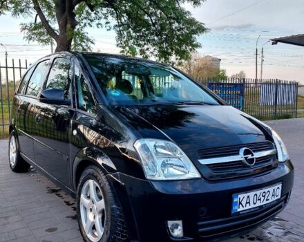 Черный Опель Мерива, объемом двигателя 1.6 л и пробегом 240 тыс. км за 4500 $, фото 1 на Automoto.ua