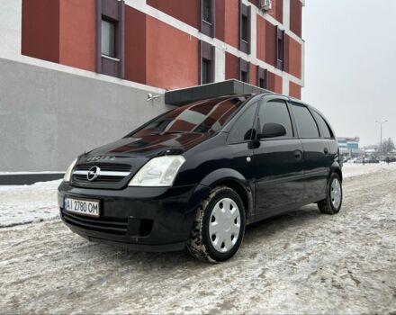 Черный Опель Мерива, объемом двигателя 1.4 л и пробегом 250 тыс. км за 3600 $, фото 1 на Automoto.ua