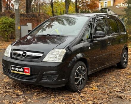 Черный Опель Мерива, объемом двигателя 1.6 л и пробегом 262 тыс. км за 4740 $, фото 1 на Automoto.ua
