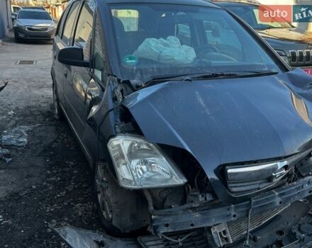 Черный Опель Мерива, объемом двигателя 1.6 л и пробегом 200 тыс. км за 1200 $, фото 1 на Automoto.ua