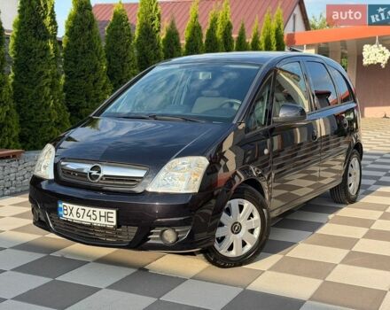 Черный Опель Мерива, объемом двигателя 1.7 л и пробегом 176 тыс. км за 4500 $, фото 1 на Automoto.ua