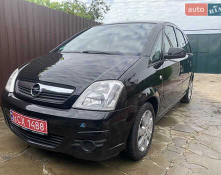 Черный Опель Мерива, объемом двигателя 1.6 л и пробегом 245 тыс. км за 5800 $, фото 1 на Automoto.ua