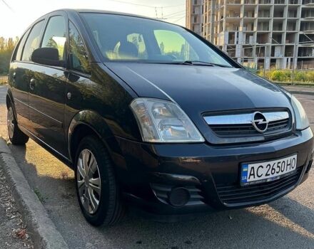 Черный Опель Мерива, объемом двигателя 1.6 л и пробегом 219 тыс. км за 4200 $, фото 1 на Automoto.ua