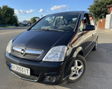 Черный Опель Мерива, объемом двигателя 1.6 л и пробегом 312 тыс. км за 3800 $, фото 1 на Automoto.ua