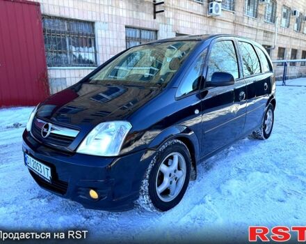 Черный Опель Мерива, объемом двигателя 1.6 л и пробегом 215 тыс. км за 3500 $, фото 1 на Automoto.ua