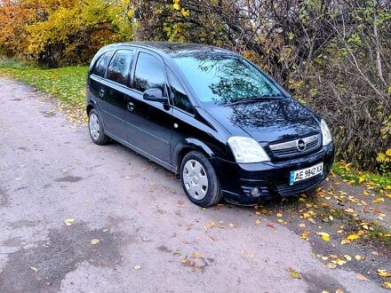 Черный Опель Мерива, объемом двигателя 1.4 л и пробегом 184 тыс. км за 5000 $, фото 1 на Automoto.ua