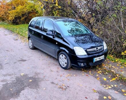 Черный Опель Мерива, объемом двигателя 1.4 л и пробегом 184 тыс. км за 5000 $, фото 1 на Automoto.ua