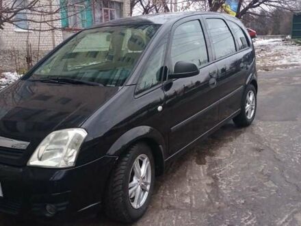Опель Меріва 2006 у Хмельницькому на Automoto.ua Чорний Опель Меріва, об'ємом двигуна 1.6 л та пробігом 225 тис. км за 4900 $, фото 1 на Automoto.ua
