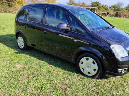 Черный Опель Мерива, объемом двигателя 1.36 л и пробегом 184 тыс. км за 5000 $, фото 1 на Automoto.ua